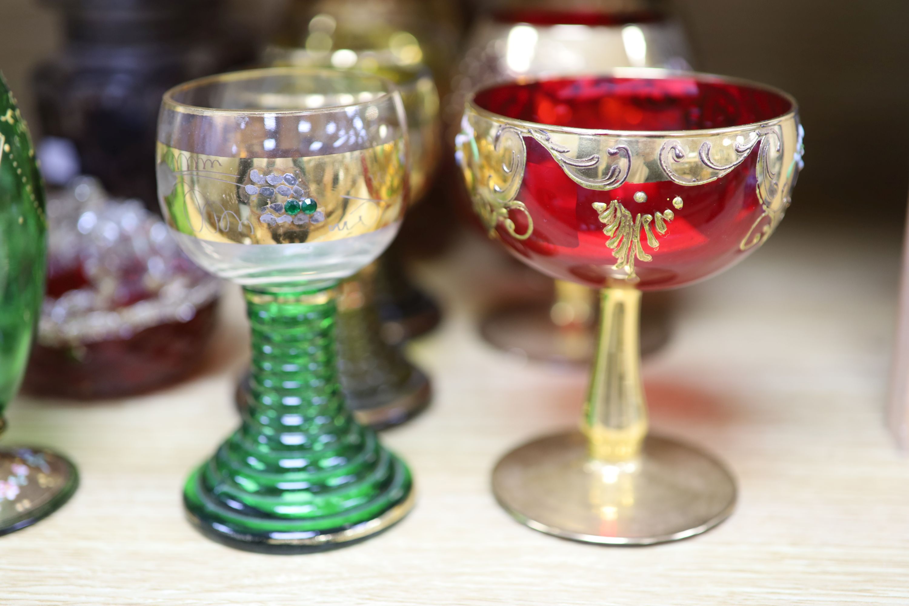 A collection of gilt decorated glasses and a jug, etc